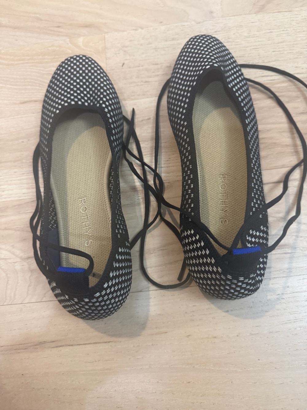 Rothy's Black and White Knit Lace-Up Flats with Blue Accent